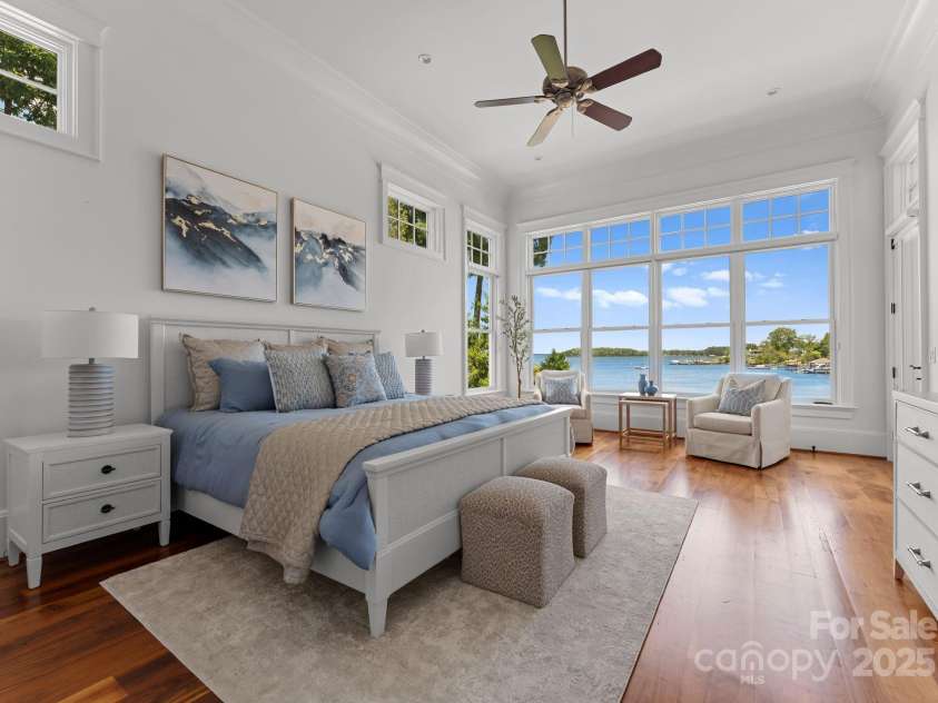 16921 Jetton Road, Cornelius, NC 28031.  MLS# CAR4191237, YatesRealty ID 971. Primary bedroom with gorgeous water views and access to covered porch