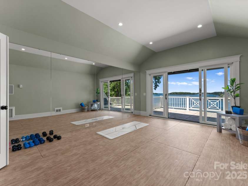 16921 Jetton Road, Cornelius, NC 28031.  MLS# CAR4191237, YatesRealty ID 971. Yoga/exercise room (hot yoga equipped)  with access to covered porch
