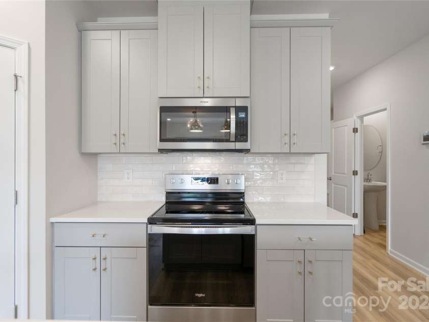 3850 County Down Avenue, Kannapolis, NC 28081.  MLS# CAR4147678, YatesRealty ID 9711. Kitchen - electric range and microwave