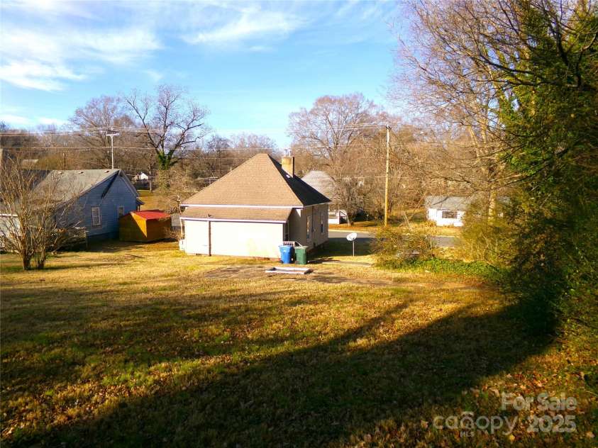 923 Efird Street, Albemarle, NC 28001.  MLS# CAR4325322, YatesRealty ID 9711. Great back yard, space for a workshop 