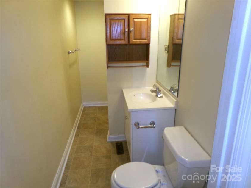 923 Efird Street, Albemarle, NC 28001.  MLS# CAR4325322, YatesRealty ID 9711. Hall Bath