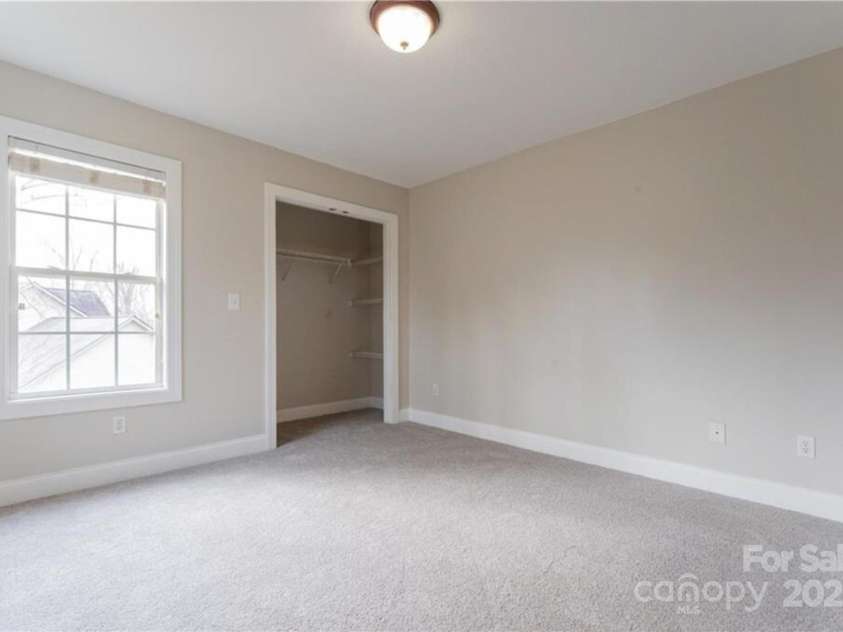 31 Helen Holcombe Way, Candler, NC 28715.  MLS# CAR4230409, YatesRealty ID 9712. En suite Bedroom 4