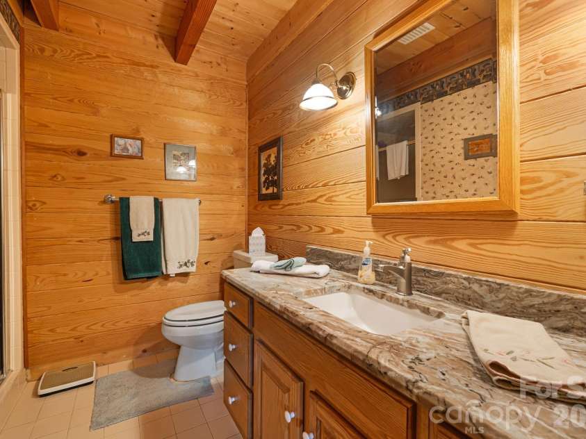215 Goldenleaf Road, Mars Hill, NC 28754.  MLS# CAR4356364, YatesRealty ID 9718. Guest Bath Lower Level