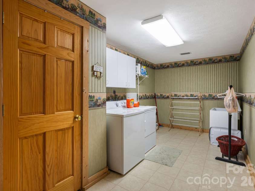 215 Goldenleaf Road, Mars Hill, NC 28754.  MLS# CAR4356364, YatesRealty ID 9718. Over-Sized Laundry Lower Level