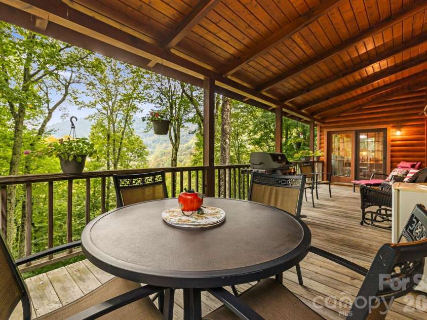 215 Goldenleaf Road, Mars Hill, NC 28754.  MLS# CAR4356364, YatesRealty ID 9718. Peaceful Cvrd Deck off Great room/Primary