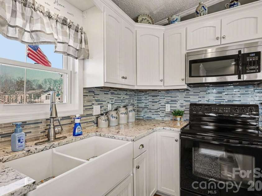 103 Oriole Road, New London, NC 28127.  MLS# CAR4335932, YatesRealty ID 972. Farmhouse style sink