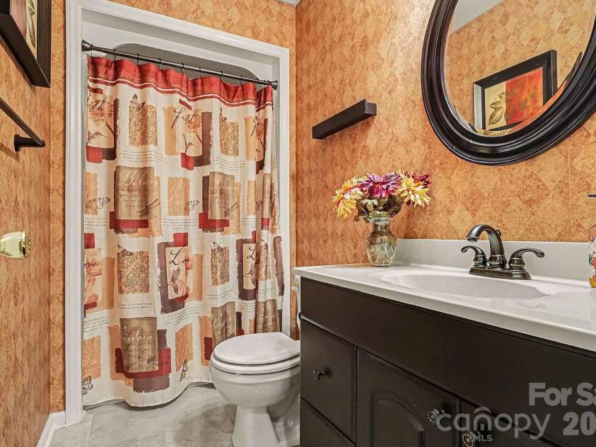 103 Oriole Road, New London, NC 28127.  MLS# CAR4335932, YatesRealty ID 972. Lower level bath
