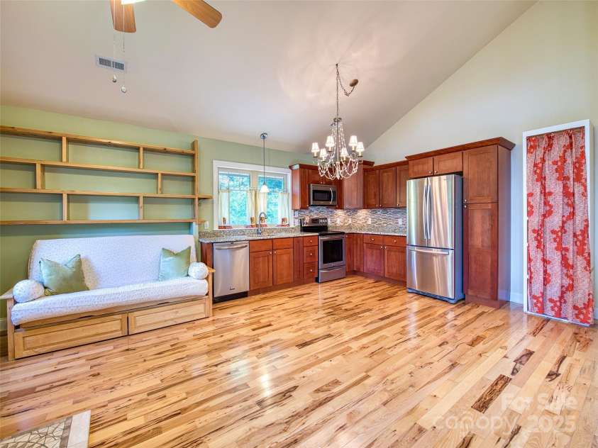 20A Lila Lane, Clyde, NC 28721.  MLS# CAR4258069, YatesRealty ID 972. Upstairs great room