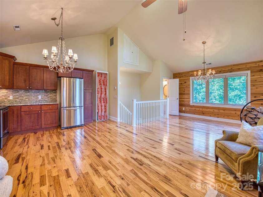 20A Lila Lane, Clyde, NC 28721.  MLS# CAR4258069, YatesRealty ID 972. Upstairs kitchen/great room