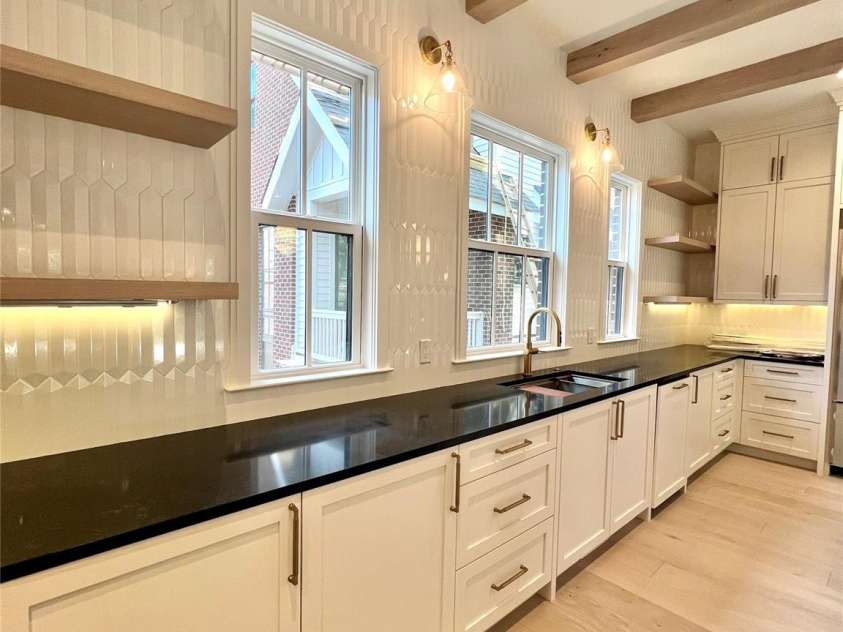 3100 Selwyn Avenue, Charlotte, NC 28209.  MLS# CAR4130767, YatesRealty ID 972. Photos from a completed home in Selwyn Walk.  Note subject is a different floor plan, added for illustrative purposes