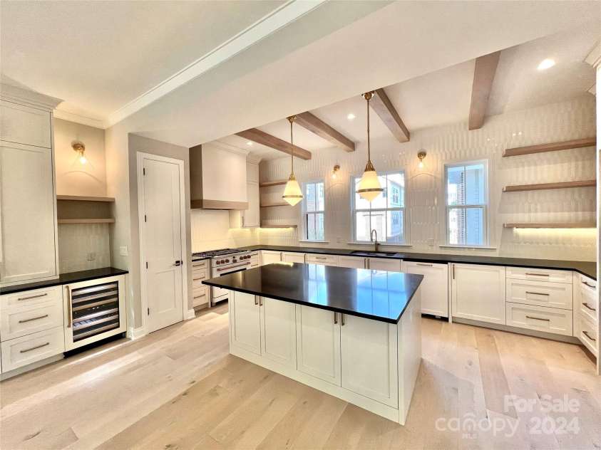 3100 Selwyn Avenue, Charlotte, NC 28209.  MLS# CAR4130767, YatesRealty ID 972. Photos from a completed home in Selwyn Walk.  Note subject is a different floor plan, added for illustrative purposes