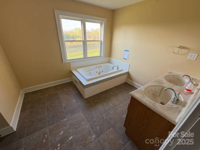 1088 Ramie Mitchell Road, Hiddenite, NC 28636.  MLS# CAR4251666, YatesRealty ID 9726. 