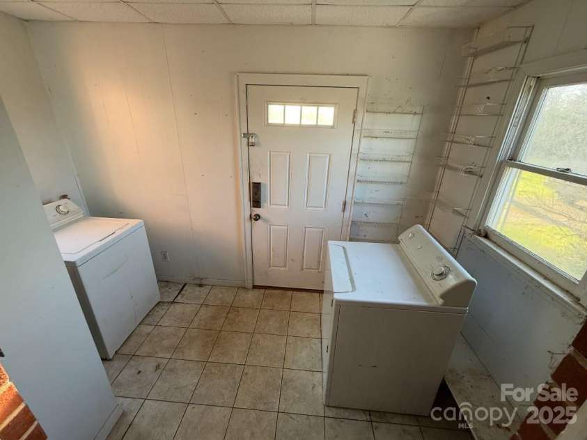 1088 Ramie Mitchell Road, Hiddenite, NC 28636.  MLS# CAR4251666, YatesRealty ID 9726. 