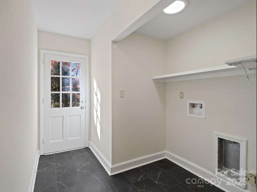 2111 Sagamore Road, Charlotte, NC 28209.  MLS# CAR4323130, YatesRealty ID 973. Laundry 