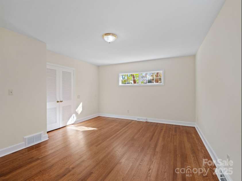 2111 Sagamore Road, Charlotte, NC 28209.  MLS# CAR4323130, YatesRealty ID 973. Primary bedroom features dual custom closets