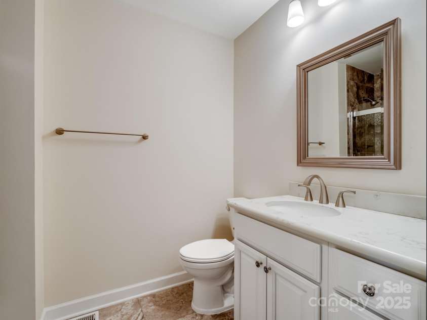 2111 Sagamore Road, Charlotte, NC 28209.  MLS# CAR4323130, YatesRealty ID 973. Renovated main level shared bathroom