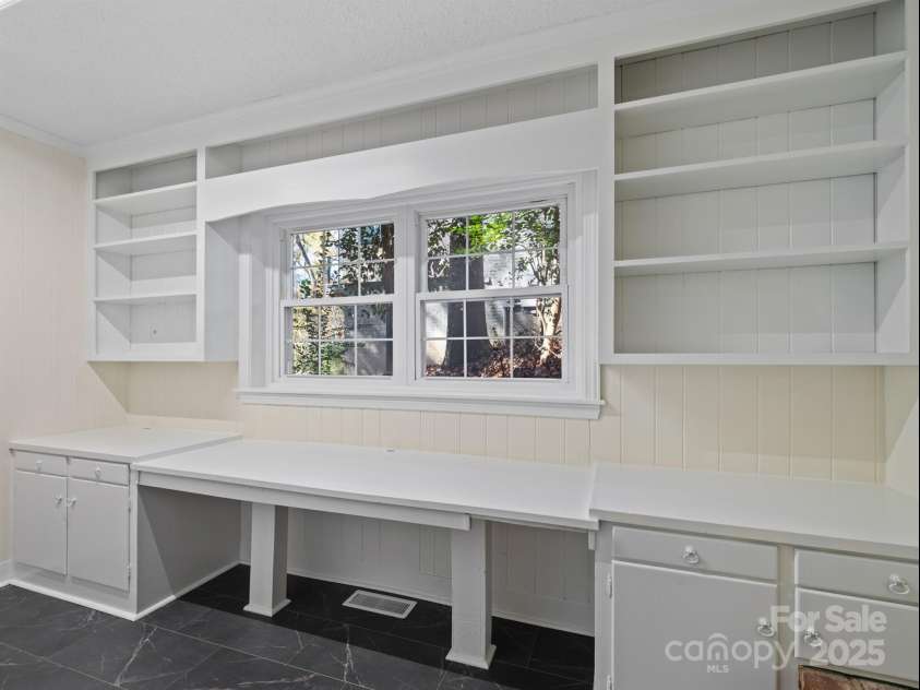 2111 Sagamore Road, Charlotte, NC 28209.  MLS# CAR4323130, YatesRealty ID 973. Work/study/craft space with storage 