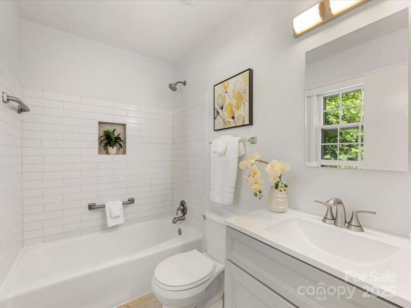 1325 Rock Point Road, Charlotte, NC 28270.  MLS# CAR4252275, YatesRealty ID 9730. Renovated hall bath
