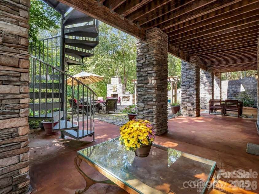 167 Trails End, Lake Lure, NC 28746.  MLS# CAR4245504, YatesRealty ID 9733. Lower patio