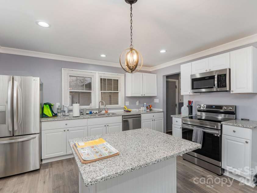 106 16th Street, Kannapolis, NC 28081.  MLS# CAR4223843, YatesRealty ID 974. Kitchen with updated Appliances and Island