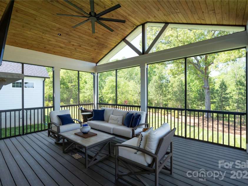 129 Ryleigh Dan Place, Mooresville, NC 28115.  MLS# CAR4222614, YatesRealty ID 9741. Big Screened in Porch off the Main House