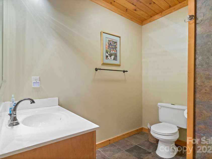 140 Spruce Hollow Road, Beech Mountain, NC 28604.  MLS# CAR4263469, YatesRealty ID 9744. LL Full Bath