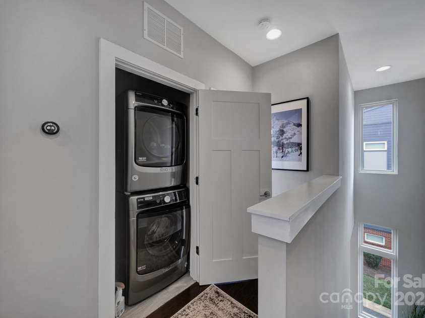 107 Poindexter Drive, Charlotte, NC 28203.  MLS# CAR4226700, YatesRealty ID 9746. Hall laundry.