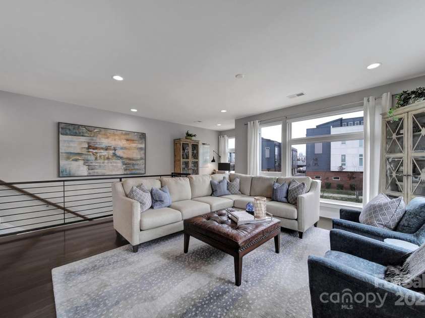 107 Poindexter Drive, Charlotte, NC 28203.  MLS# CAR4226700, YatesRealty ID 9746. Main level open-concept living area.