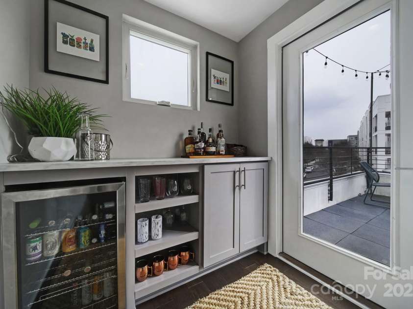 107 Poindexter Drive, Charlotte, NC 28203.  MLS# CAR4226700, YatesRealty ID 9746. Rooftop built-in bar.