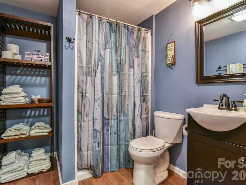 48 Buck Ridge Road, Fairview, NC 28730.  MLS# CAR4290270, YatesRealty ID 9748. Basement bathroom