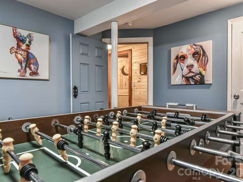 48 Buck Ridge Road, Fairview, NC 28730.  MLS# CAR4290270, YatesRealty ID 9748. Basement game room