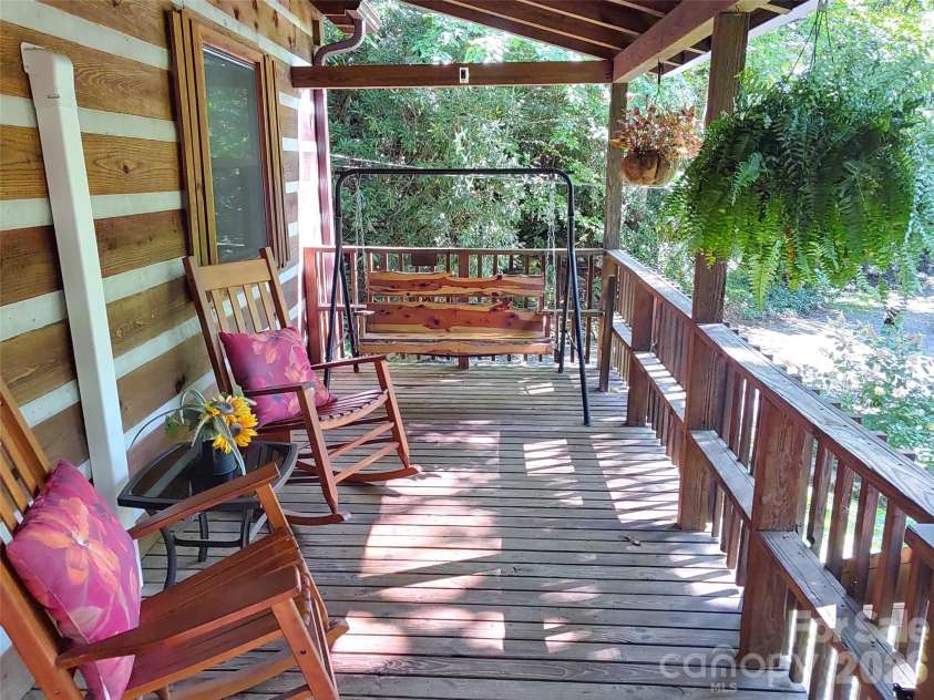 48 Buck Ridge Road, Fairview, NC 28730.  MLS# CAR4290270, YatesRealty ID 9748. Front porch