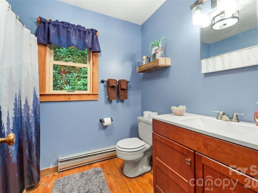 48 Buck Ridge Road, Fairview, NC 28730.  MLS# CAR4290270, YatesRealty ID 9748. Upstairs bathroom