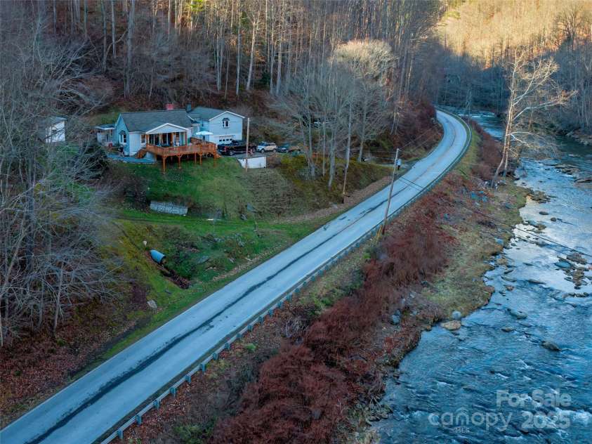 12982 US Hwy 19W None, Burnsville, NC 28714.  MLS# CAR4234088, YatesRealty ID 975. Bold Cane River front
