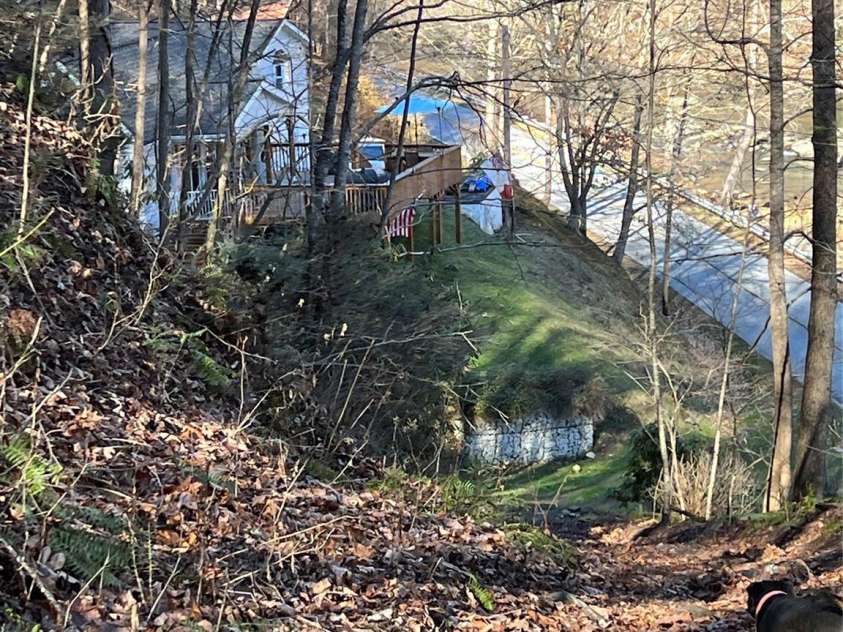 12982 US Hwy 19W None, Burnsville, NC 28714.  MLS# CAR4234088, YatesRealty ID 975. House coming down from land road.