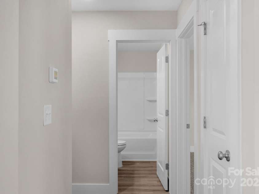 103 Orchard Street, Forest City, NC 28043.  MLS# CAR4199091, YatesRealty ID 9753. Hallway to full bath