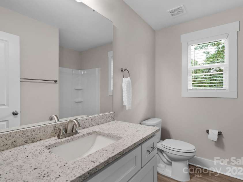 103 Orchard Street, Forest City, NC 28043.  MLS# CAR4199091, YatesRealty ID 9753. Primary bath