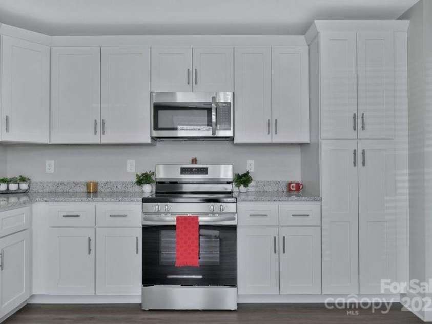 131 Orchard Street, Forest City, NC 28043.  MLS# CAR4199096, YatesRealty ID 9754. Kitchen & pantry