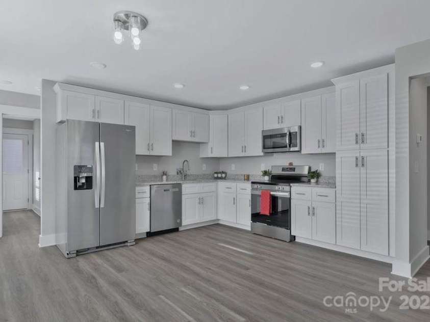 131 Orchard Street, Forest City, NC 28043.  MLS# CAR4199096, YatesRealty ID 9754. Kitchen with appliances!