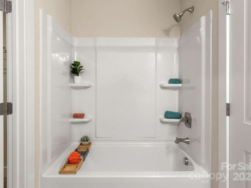 121 Orchard Street, Forest City, NC 28043.  MLS# CAR4199095, YatesRealty ID 9756. Primary bath tub