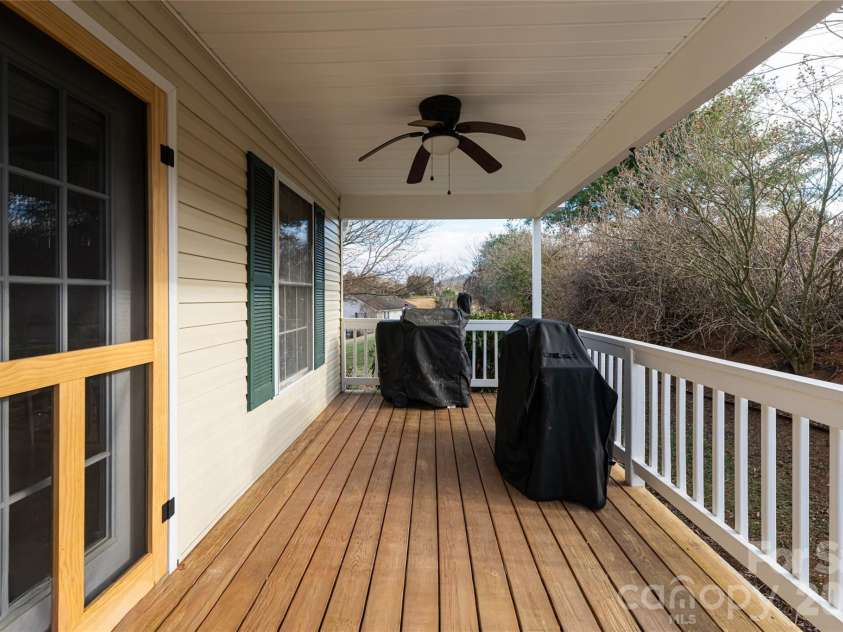 16 Kinsale Drive, Leicester, NC 28748.  MLS# CAR4340281, YatesRealty ID 9765. Back deck