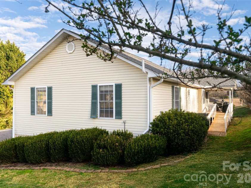 16 Kinsale Drive, Leicester, NC 28748.  MLS# CAR4340281, YatesRealty ID 9765. Side
