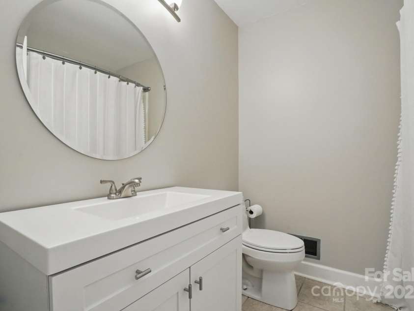1917 Bentley Place, Charlotte, NC 28205.  MLS# CAR4250365, YatesRealty ID 9767. Guest Bathroom
