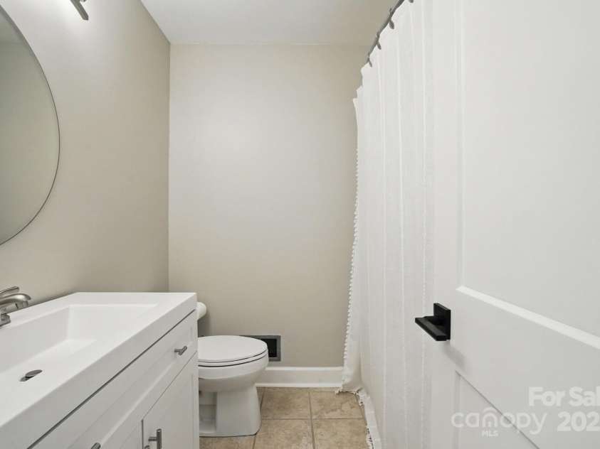 1917 Bentley Place, Charlotte, NC 28205.  MLS# CAR4250365, YatesRealty ID 9767. Guest Bathroom