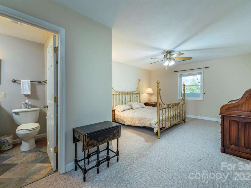1740 Haywood Road, Hendersonville, NC 28791.  MLS# CAR4226897, YatesRealty ID 977. Fourth guest bedroom with a private ensuite bathroom