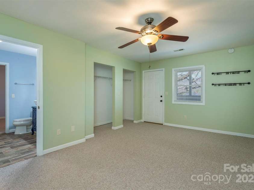 1740 Haywood Road, Hendersonville, NC 28791.  MLS# CAR4226897, YatesRealty ID 977. Jack and Jill guest bedrooms 2 and 3, with access to covered porch.