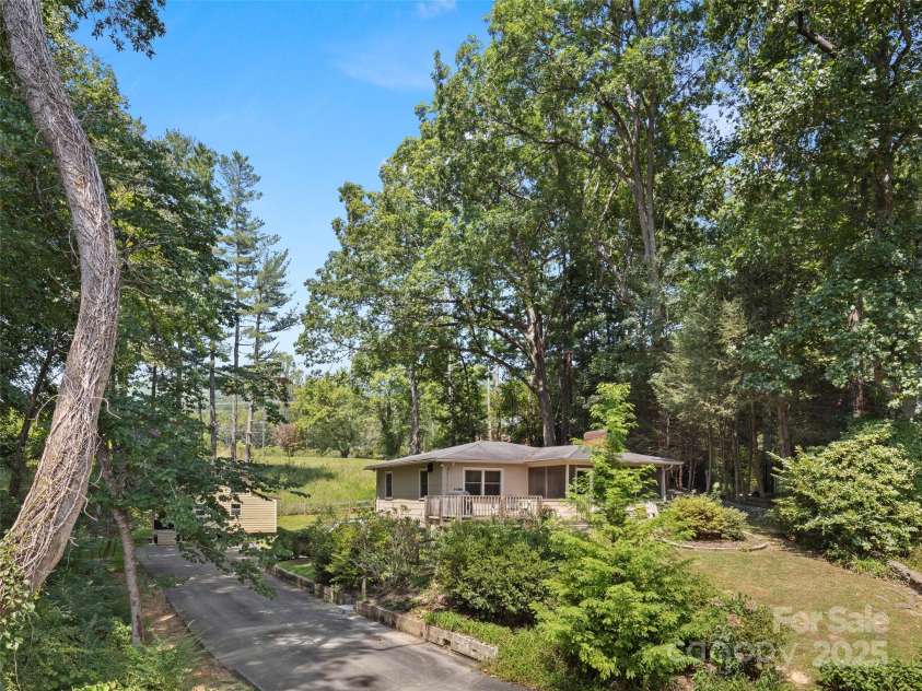 250 Mondamin Road, Zirconia, NC 28790.  MLS# CAR4248567, YatesRealty ID 9771. 250 Mondamin