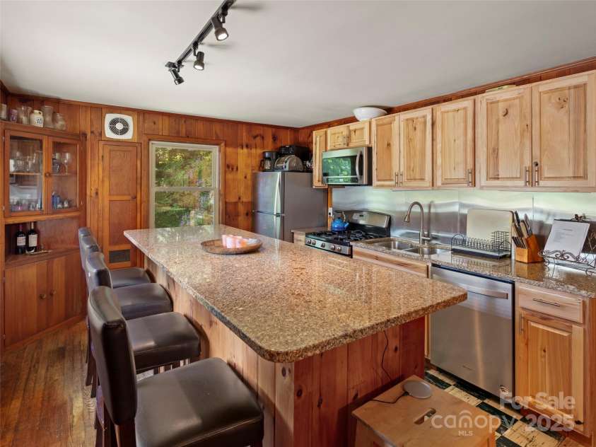 250 Mondamin Road, Zirconia, NC 28790.  MLS# CAR4248567, YatesRealty ID 9771. Main house kitchen