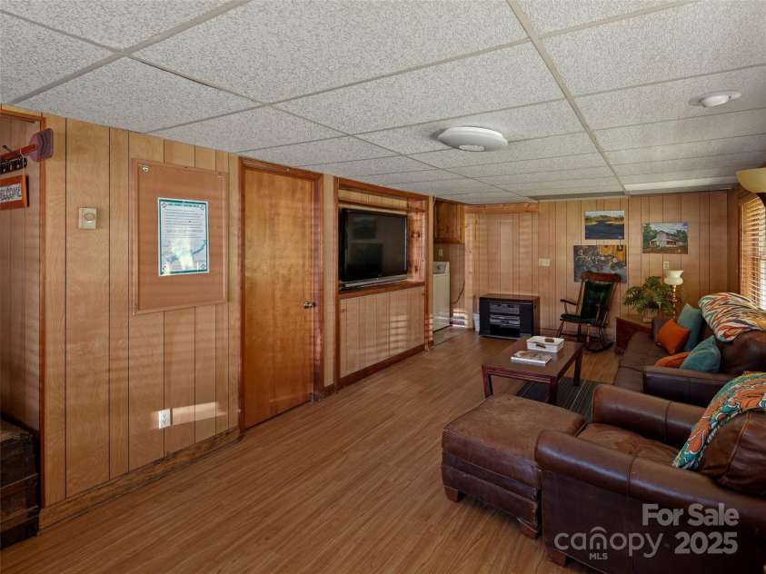 250 Mondamin Road, Zirconia, NC 28790.  MLS# CAR4248567, YatesRealty ID 9771. Main house lower level