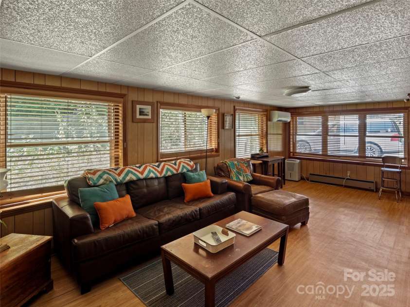 250 Mondamin Road, Zirconia, NC 28790.  MLS# CAR4248567, YatesRealty ID 9771. Main house lower level